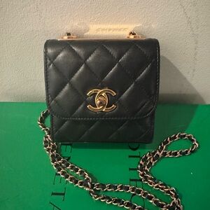 Beautiful black and ROSE GOLD small Chanel crossbody bag.